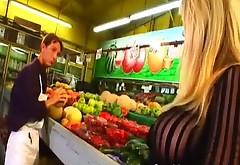 Blond haired kinky bombshell deep throats hard cock of seller at the market