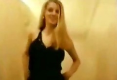 Sexy and cute blondie sucks a dick right in the dressing-room of the shop